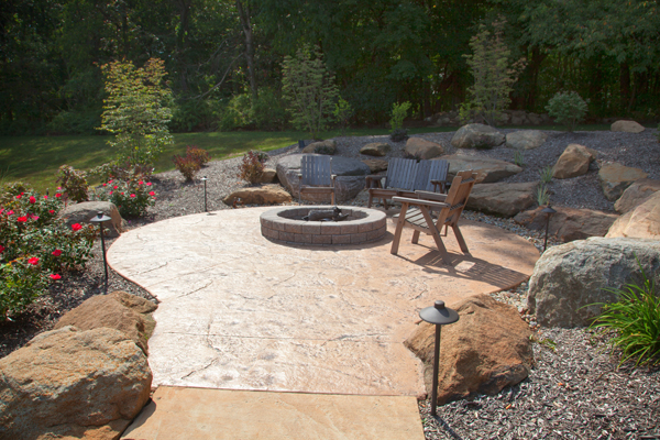 Firepit Patio in Hillside with Large Rock Croppings